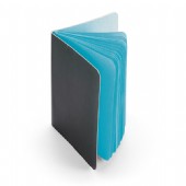 Svart anteckningsblock med färgat papper.