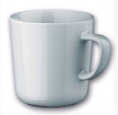 Moccamugg i keramik med vit insida och färgad utsida